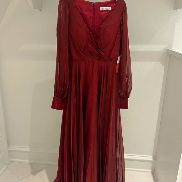 New Mac Duggal pleaded long sleeve V-neck gown